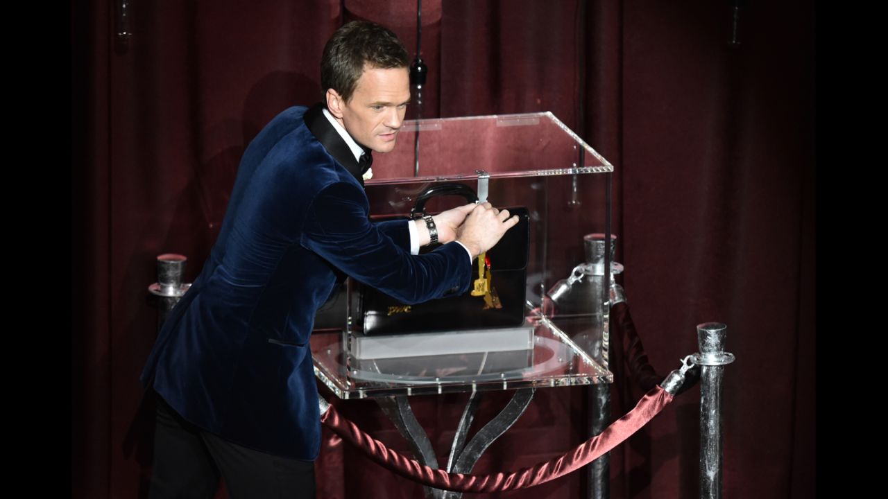Host Neil Patrick Harris presents his Oscar predictions, which were kept locked in a briefcase on stage during the show.
