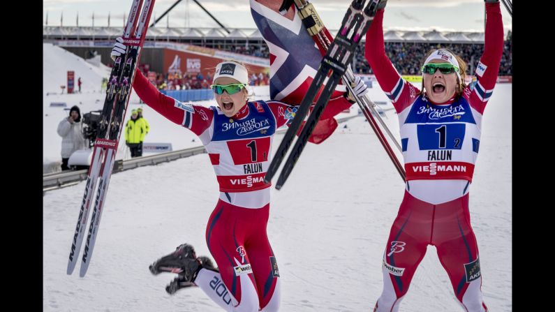 Norwegian cross-country skiers Ingvild Flugstad Oestberg, left, and Maiken Caspersen Falla rejoice Sunday, February 22, after a team sprint win at the Nordic World Ski Championships in Falun, Sweden.
