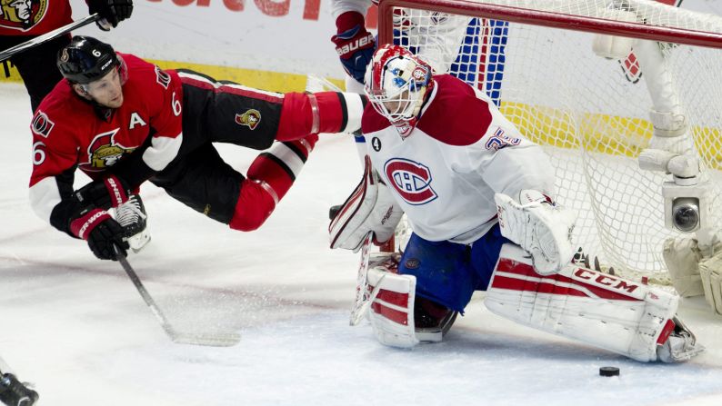 Montreal Canadiens goalie Dustin Tokarski saves a diving shot from Ottawa's Bobby Ryan during an NHL game in Ottawa on Wednesday, February 18.