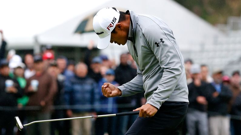 James Hahn pumps his fist after hitting a 25-foot putt that would win him the Northern Trust Open on Sunday, February 22, in Pacific Palisades, California. Hahn's winning putt came on the third hole of a playoff against Dustin Johnson and Paul Casey. It was his first win on the PGA Tour.