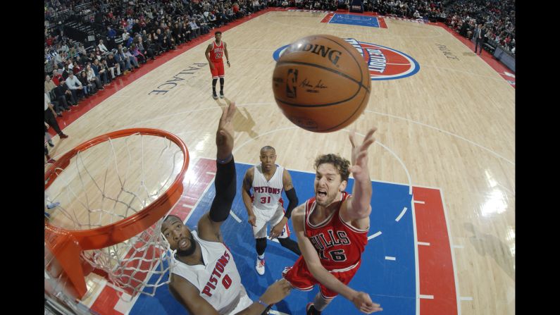 Pau Gasol of the Chicago Bulls gets off a shot while being guarded by Detroit's Andre Drummond on Friday, February 20.