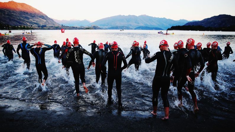 Competitors start the swim leg of Challenge Wanaka, a triathlon held Sunday, February 22, in Wanaka, New Zealand. <a target="_blank">See 33 amazing sports photos from last week</a>
