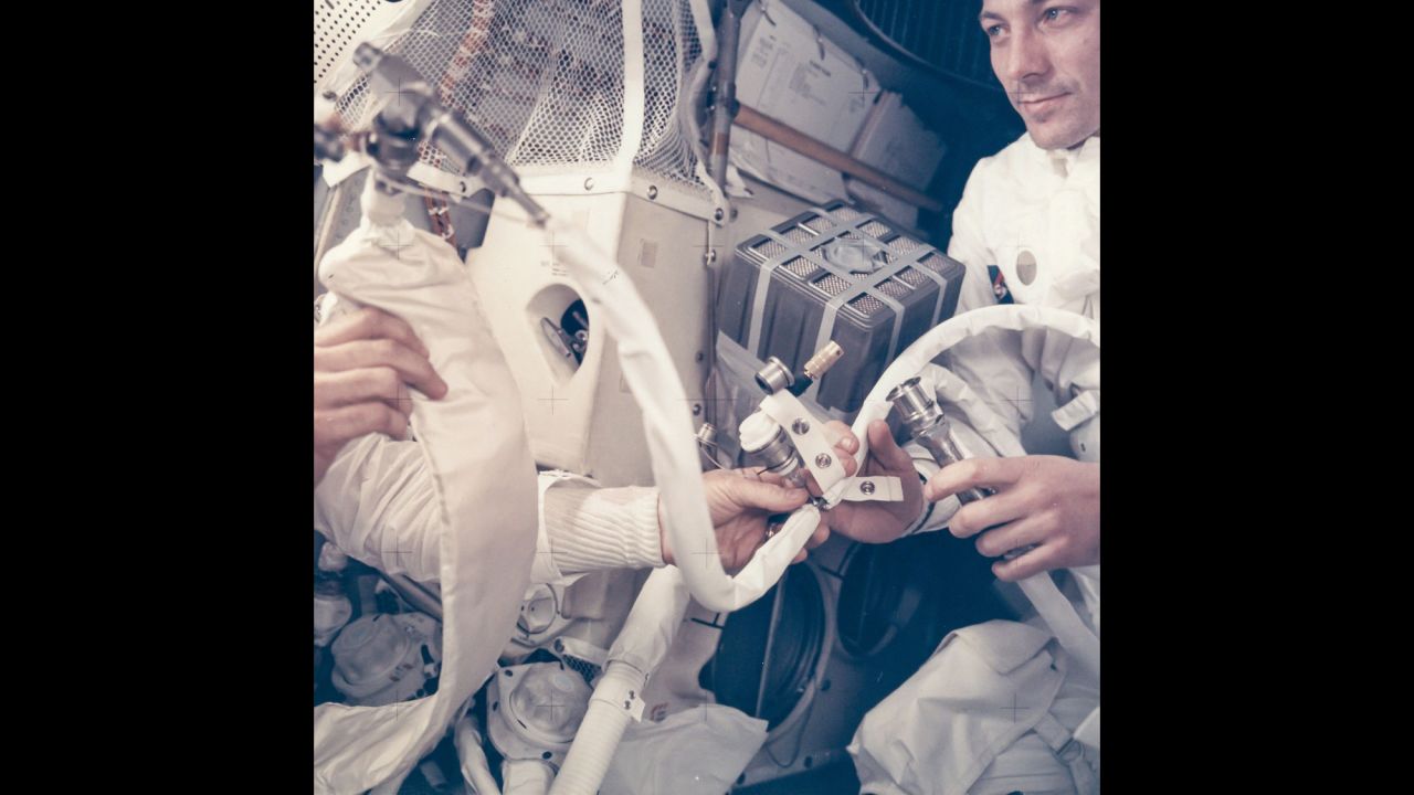 Jack Swigert works on the "mailbox" in the Apollo 13 lunar module Aquarius in April 1970. The service module that had been due to take the astronauts back to Earth was destroyed by an oxygen tank explosion. Speaking to mission control, Jim Lovell delivered the famous line: "Houston, we've had a problem." In order to purge carbon dioxide from the lunar module, an improvised contraption that became known as the mailbox was devised. "I never felt we were in a hopeless situation," Fred Haise said. "No, we never had that emotion at all. We never were with our backs to the wall, where there were no more ideas, or nothing else to try, or no possible solution. That never came." 