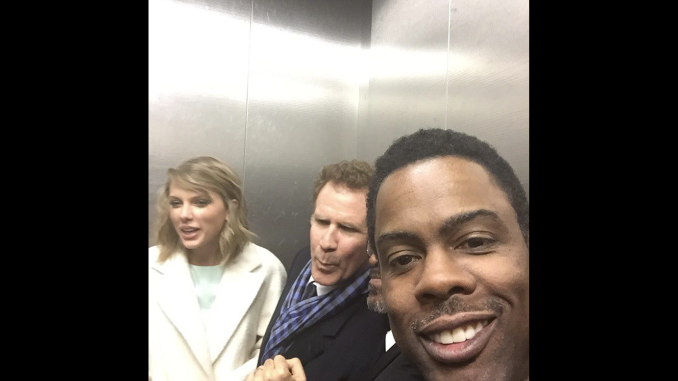 Comedian Chris Rock <a href="https://instagram.com/p/zQlWThim9F/?modal=true" target="_blank" target="_blank">snaps an elevator selfie</a> with singer Taylor Swift and actor Will Ferrell on Wednesday, February 18.