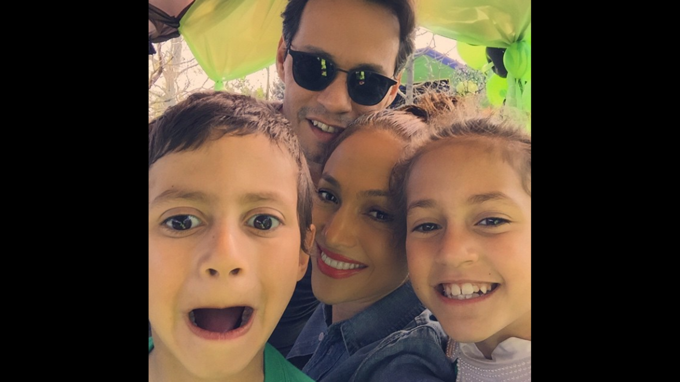 Jennifer Lopez and her ex-husband, fellow singer Marc Anthony, take a photo with their children on Saturday, February 21. "Party time!!!" <a href="https://instagram.com/p/zYZEgfmuM_/?modal=true" target="_blank" target="_blank">Lopez wrote on Instagram.</a> "HAPPY 7th BIRTHDAY TO THE COCONUTS!! #thesetwoknowhowtoparty #twins #LOVE #familia." 