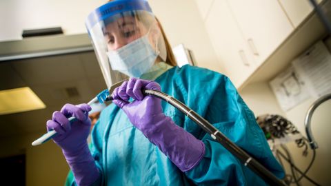 A technician cleans a duodenoscope. The FDA issued advice to hospitals to follow manufacturer's instructions and also "meticulously" clean by hand a part of the scope that may harbor bacteria that is hard to get at, after reports that the scopes were spreading superbugs from patient to patient in several medical facilities around the country.