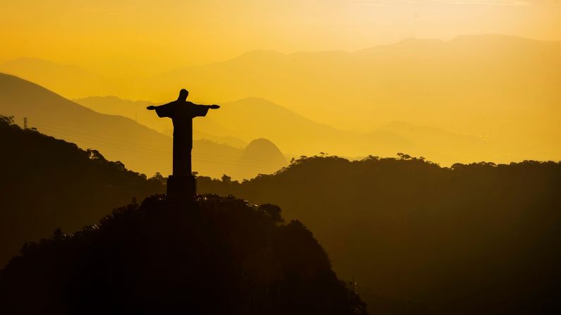 The Christ the Redeemer statue stands over the popular Tijuca National Park in Brazil.