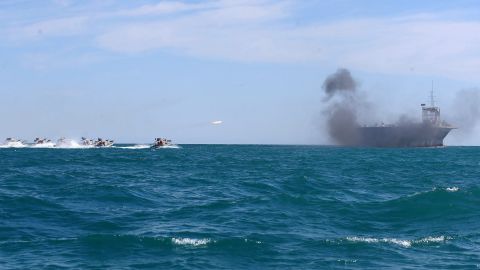 Revolutionary Guard troops use speed boats to attack the vessel.