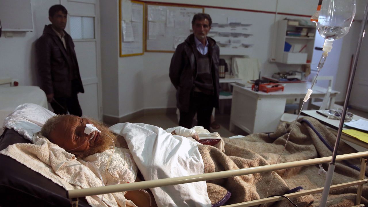 An avalanche survivor lies in a hospital in Panjshir province February 25.
