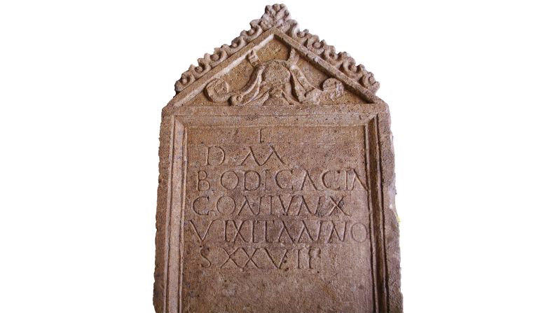A rare Roman tombstone found in Gloucestershire, England, weeks ago was turned over Wednesday to reveal an inscription: "To the spirits of the departed/Bodicacia/faithful wife/died aged 27," <a href="http://www.cotswoldarchaeology.co.uk/exciting-news-incredibly-rare-roman-tombstone-found-in-cirencester/" target="_blank" target="_blank">according to a preliminary translation by Cotswold Archeology</a>.