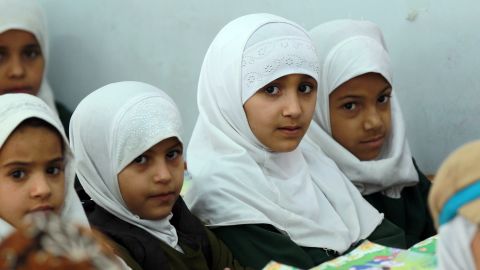 Yemeni schoolgirls attend a class in 2015 in the capital Sanaa.