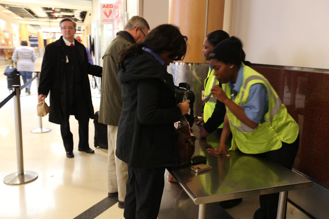 Atlanta airport security checks employee belongings. (Photo by Yasmin Khorram/CNN)