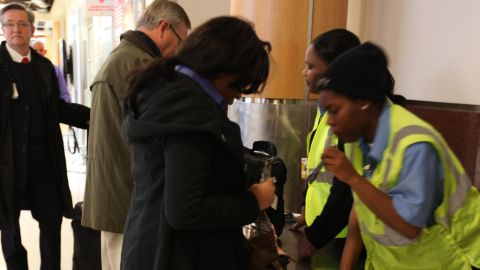 Atlanta airport security checks employee belongings. (Photo by Yasmin Khorram/CNN)