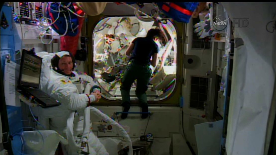 Astronauts Terry Virts, seated, and Anton Shkaplerov.