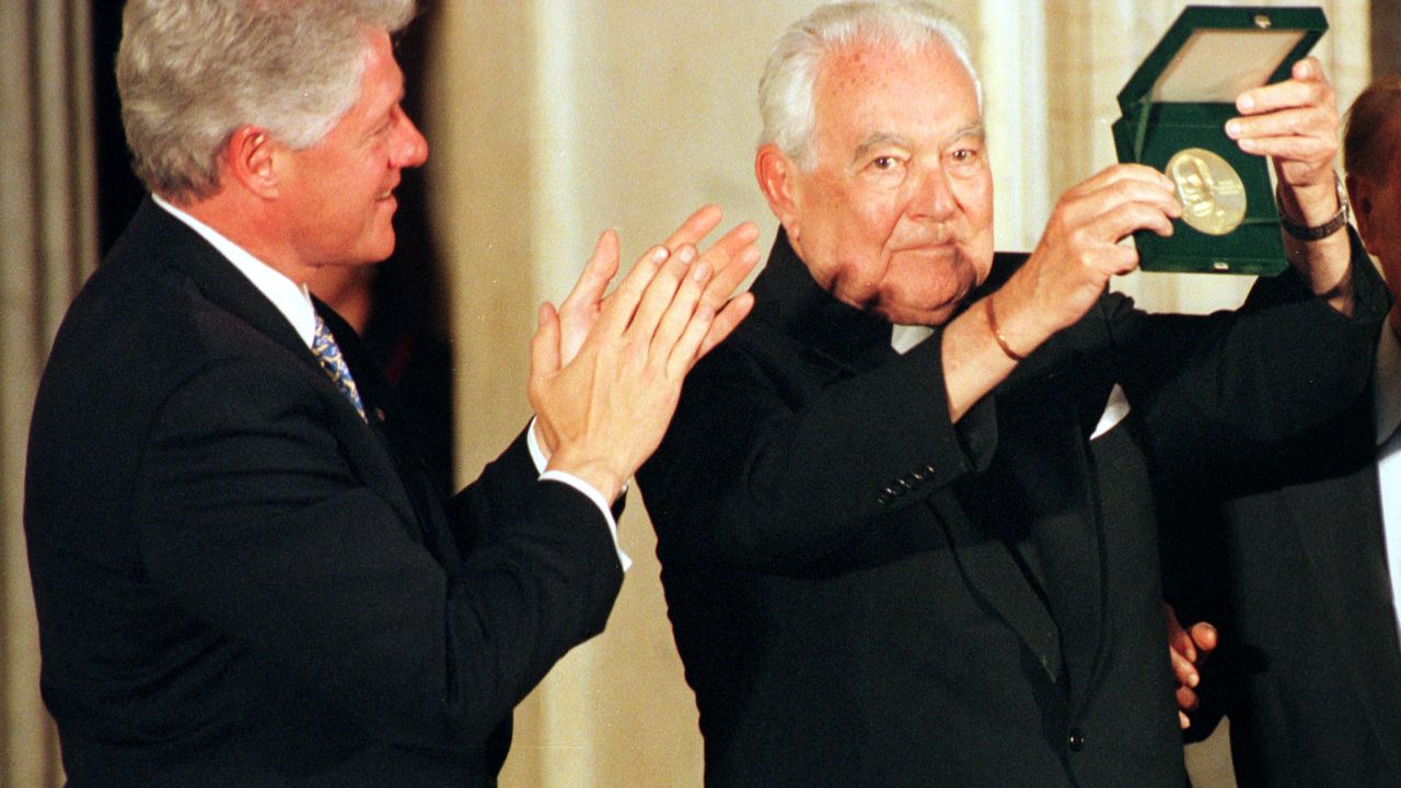 Father Theodore Hesburgh receives the Congressional Gold Medal in 2000.