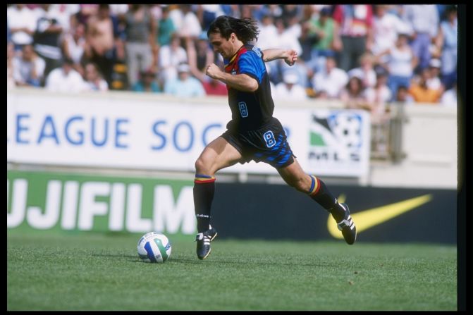 The early MLS provided a mix of footballing excitement, strange rule changes (among which were countdowns at the end of each half and no tie games) and questionable haircuts. Here, the mulleted Eric Eichmann of Kansas City Wizards runs with the ball during the Wizards 1996 season 3-2 MLS win over the San Jose Clash.