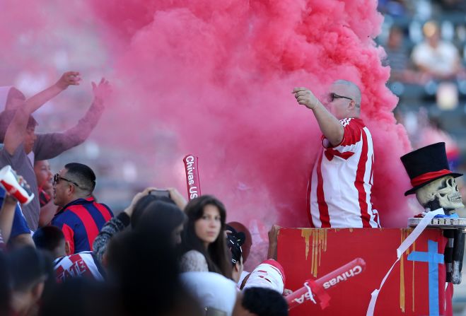 Three MLS franchises have folded over the course of the league's existence. Tampa Bay and Miami Fusion in 2001 as well as Chivas USA most recently in 2014. Here, fans of Chivas USA provide noise and color to welcome their team at one of their last ever games.