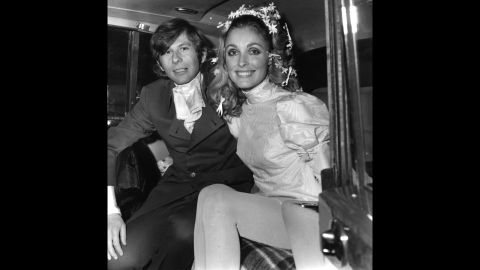 Polanski and actress Sharon Tate pose for photos after their wedding in 1968.