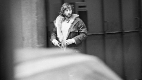 Polanski walks down a street in Paris a few weeks after he fled the United States in February 1978.