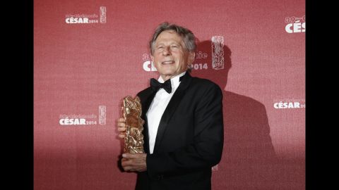 Polanski poses with his Cesar Award for best director in Paris in February 2014.