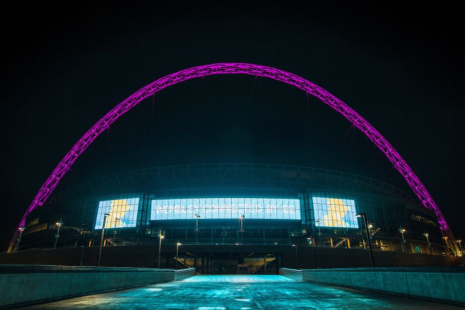 Twitter will play a part in the English League Cup final between Chelsea and Tottenham Hotspur on Sunday. Wembley Stadium's famous arch, shown here glowing pink for a breast cancer awareness campaign, will turn blue or white depending on which team's hashtag is most popular.