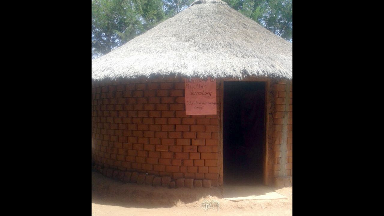 Priscilla Sitienei has her own special dorm room at the boarding school in Eldoret. Outside her door is a sign that says "education has no age limit."