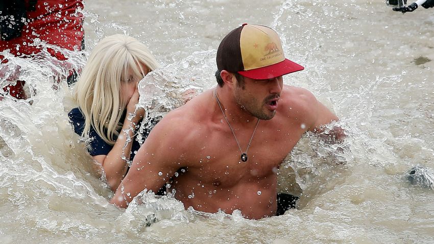 CHICAGO, IL - MARCH 01: Lady Gaga and Taylor Kinney participates in the Chicago Polar Plunge 2015 at North Avenue Beach on March 1, 2015 in Chicago, Illinois. (Photo by Tasos Katopodis/Getty Images)