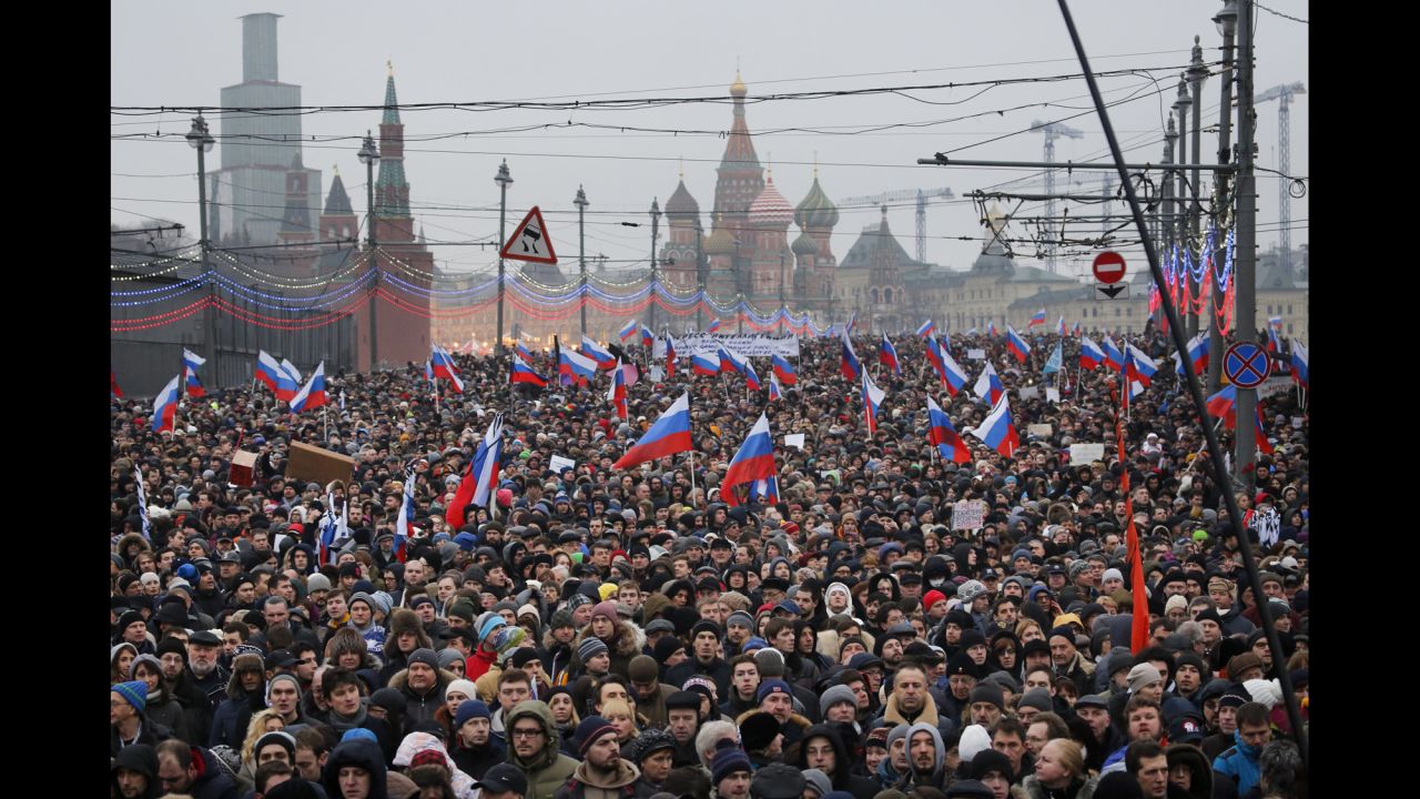People march in memory of Nemtsov in Moscow on Sunday, March 1.