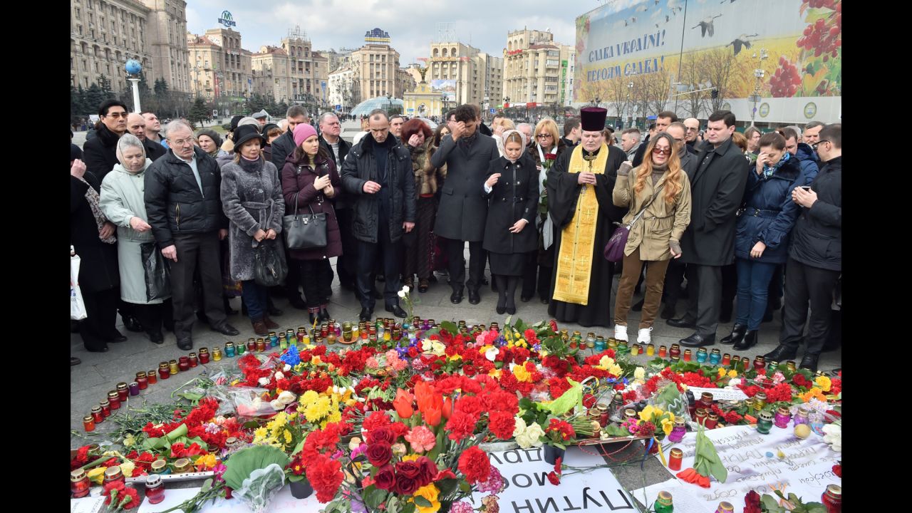 People gather to honor Nemtsov during a ceremony at Maidan, or Independence, Square in Kiev, Ukraine, on March 1.