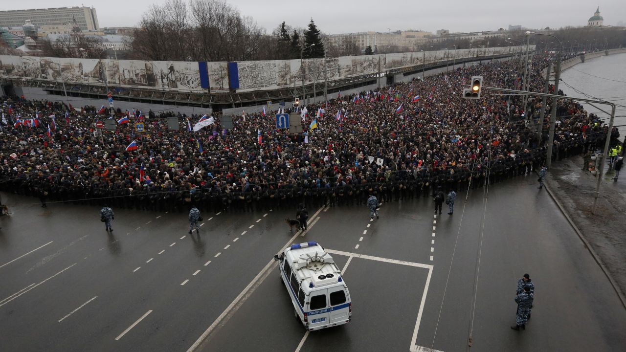 People march near the Kremlin in Moscow on March 1.