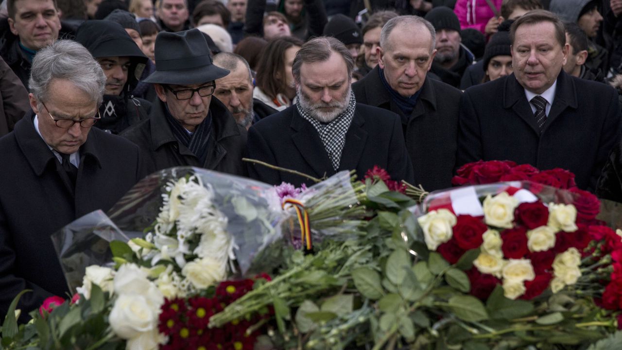 A group of European Union ambassadors to Russia lay flowers on February 28 at the site where Nemtsov was gunned down in Moscow.