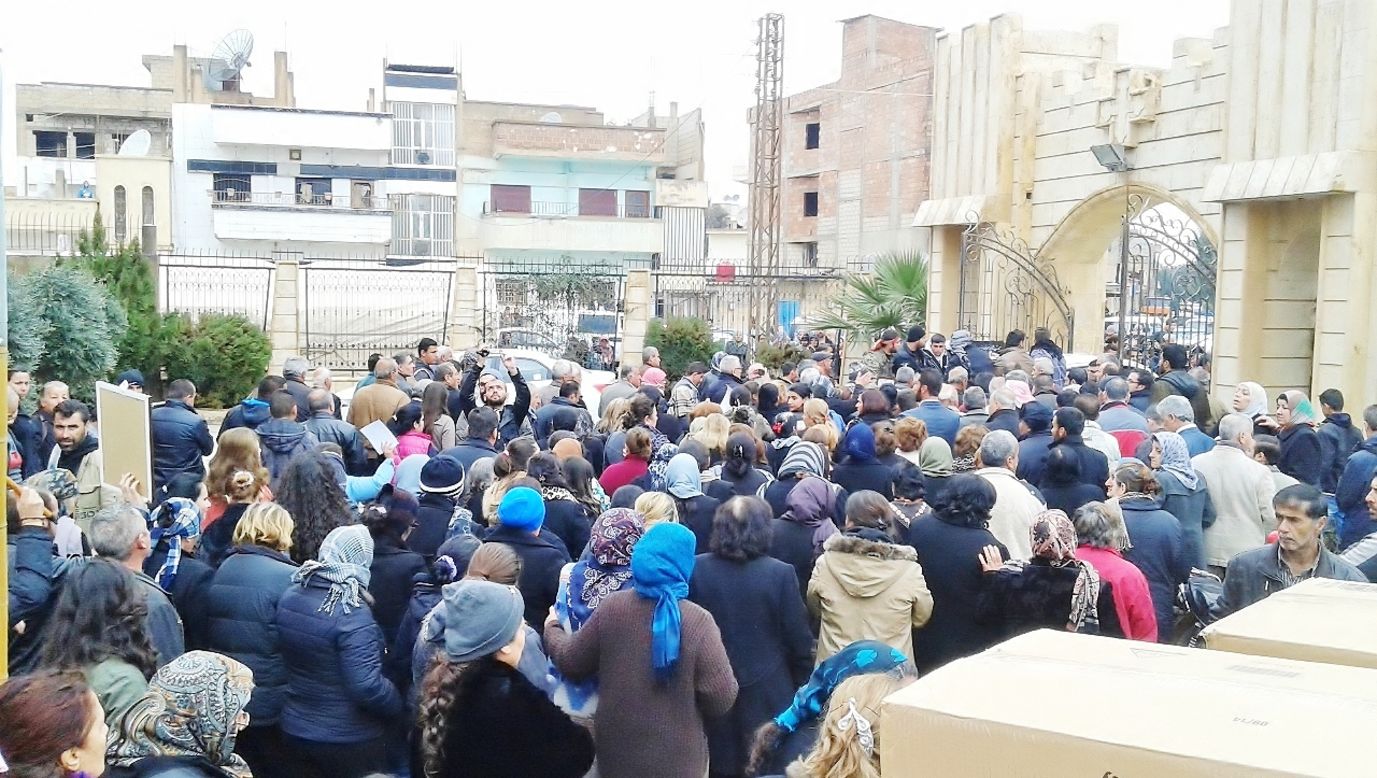 Exhausted and traumatized Christians from villages in northeastern Syria gather at an Orthodox Christian church in Hasakah, Syria, seeking refuge after their small communities were terrorized. IOCC and its church partner, the Greek Orthodox Patriarchate of Antioch and All the East, is providing food, medical attention and emergency aid to more than 1,000 displaced families. 