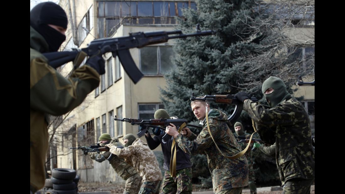An instructor of the Ukrainian volunteer Azov Battalion conducts training exercises in Kiev, Ukraine, on Sunday, March 1.