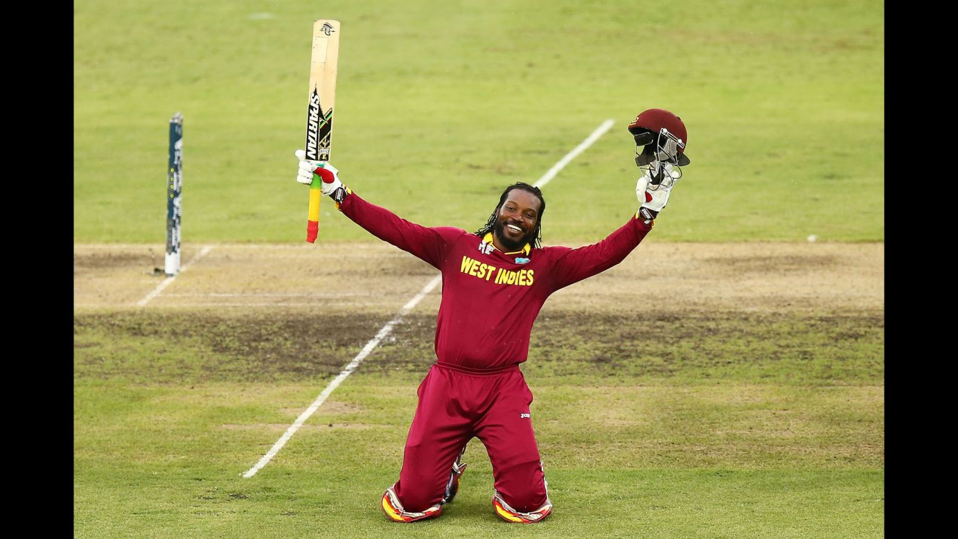 Chris Gayle of the West Indies celebrates after he scored a double century against Zimbabwe during a Cricket World Cup match played Tuesday, February 24, in Canberra, Australia. The West Indies won the match by 73 runs.