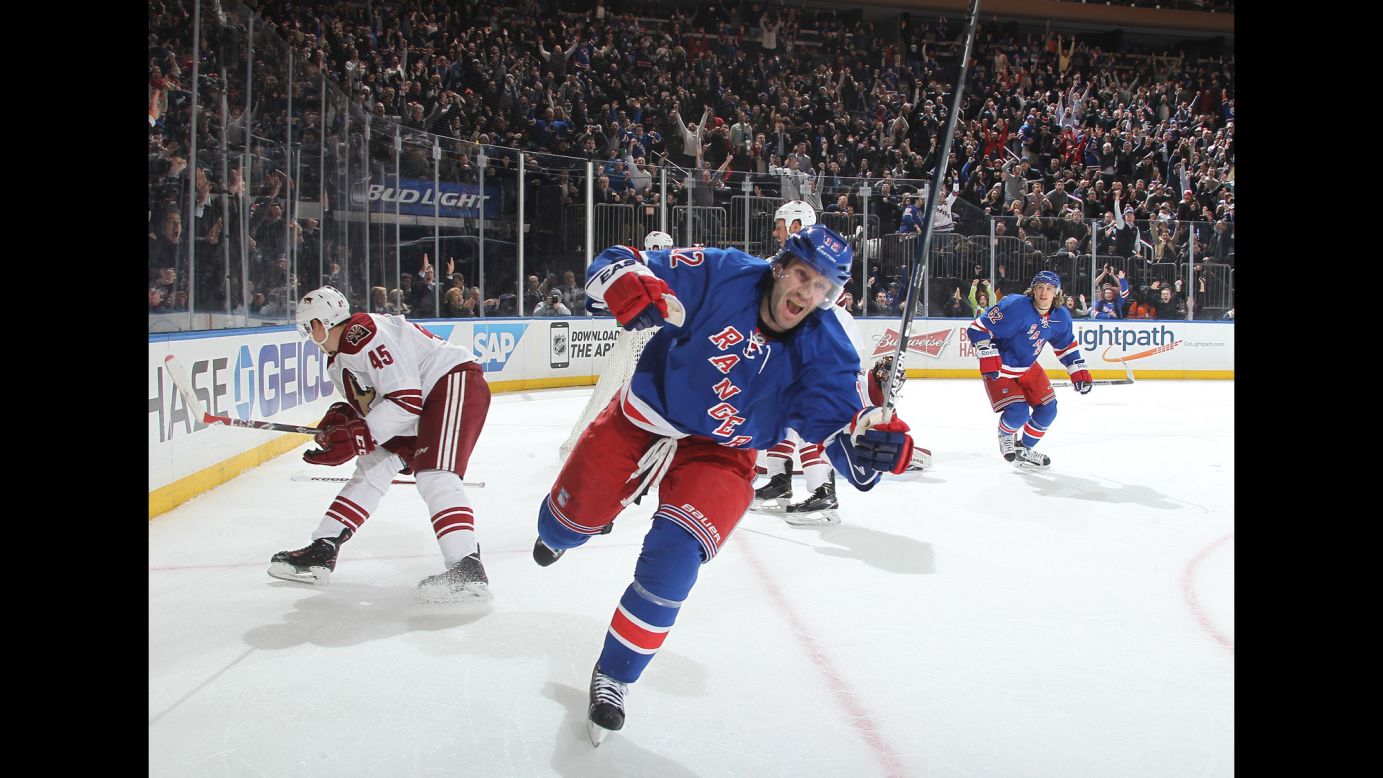 Lee Stempniak, center, reacts after scoring what proved to be the game-winning goal during the New York Rangers' 4-3 home win over Arizona on Thursday, February 26. It would be his final goal for the team, as he was traded several days later to the Winnipeg Jets.