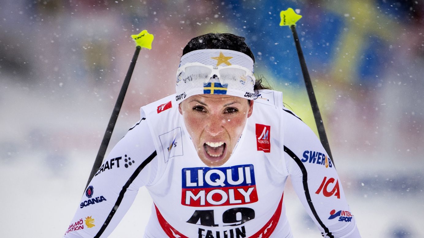 Swedish cross-country skier Charlotte Kalla celebrates after winning the gold medal in the 10-kilometer freestyle Tuesday, February 24, at the Nordic World Ski Championships.