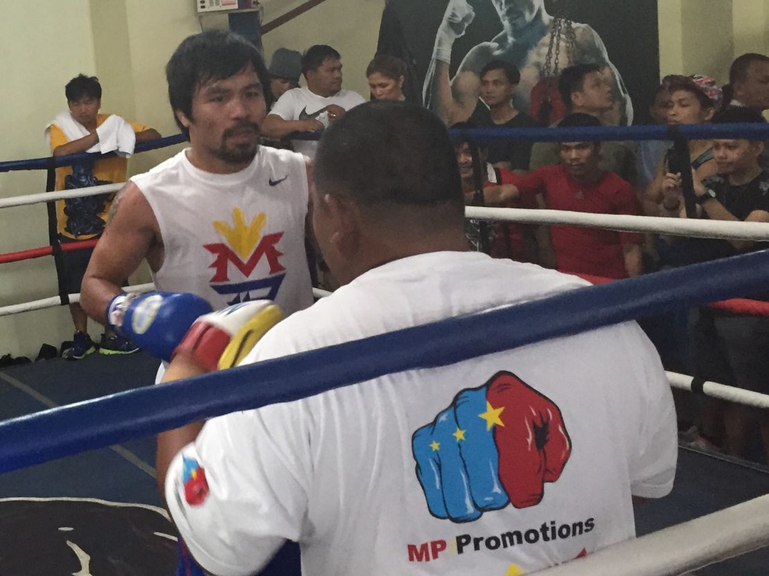 Manny Pacquiao takes to the ring at his gym for a sparring session.