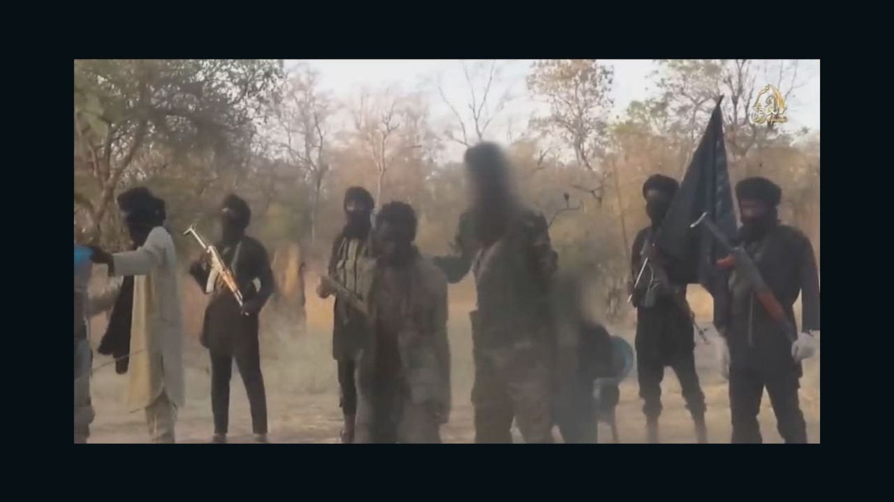A still image from a Boko Haram video appears to show the run up to the beheading of two men accused of spying.