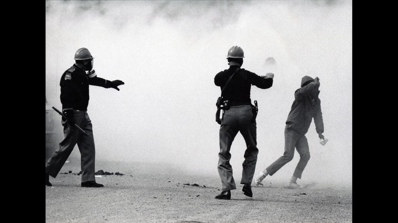 Alabama state troopers wear gas masks as tear gas is fired on marchers in 1965. Fifty years ago, about 600 people began a 50-mile march from Selma, Alabama, to the state capital of Montgomery so that they could protest discriminatory practices that prevented black people from voting. But as the marchers descended to the foot of the Edmund Pettus Bridge, state troopers used brutal force and tear gas to push them back. It is now known as "Bloody Sunday."