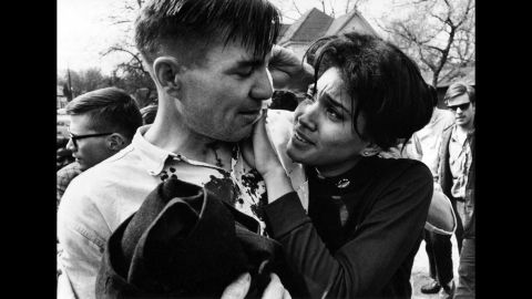 Harriet Richardson, a student activist, presses a cloth to the wounds of bloodied poet Galway Kinnell in Selma.