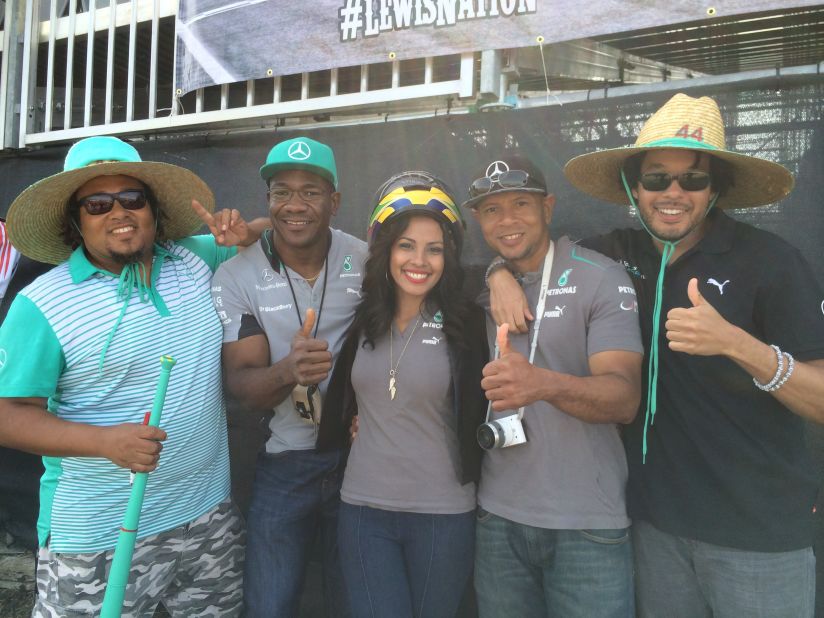 New Yorker Christopher Thomas (second right) and his fiancee Julliana Sanchez (center) are original members of the Lewis Nation collective. The group formed in 2010 and use the hashtag #lewisnation to unite worldwide Hamilton fans on social media. 