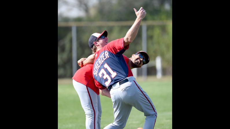 Max Scherzer, one of the newest members of the Washington Nationals, takes a virtual selfie Monday, March 2, while stretching with teammate Gio Gonzalez in Viera, Florida.
