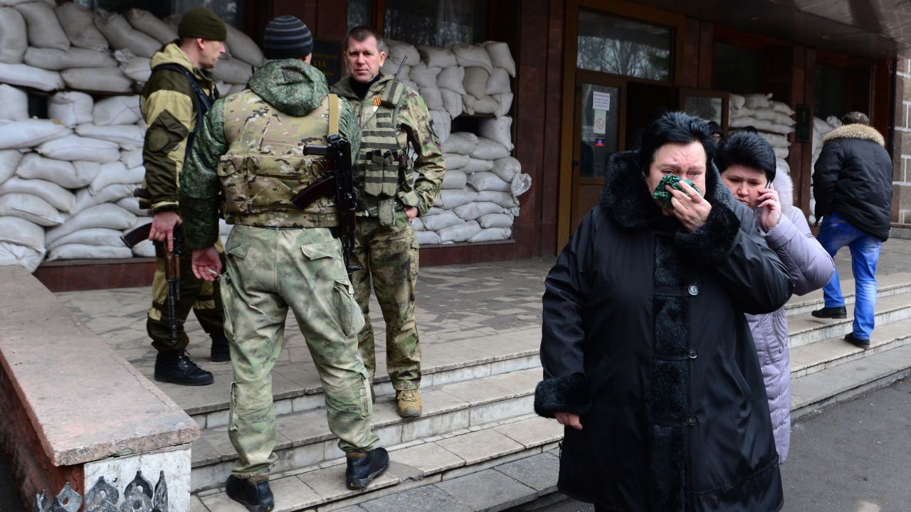 Relatives of miners leave the main entrance of the Zasyadko mine in Donetsk after the mine was rocked by an explosion on March 4, 2015.