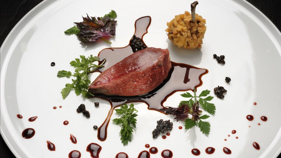Osteria Francescana's "Hunting the Pigeon" dish features pigeon breast, beetroot juice, turnips, porcini mushrooms, apples and truffles. 