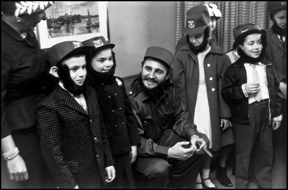 During a visit to New York in 1959, Fidel Castro spends time with a group of children.