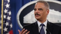 WASHINGTON, DC - MARCH 04: Attorney General Eric Holder delivers remarks about the Justice Department's findings related to two investigations in Ferguson, Missouri, at the Robert F. Kennedy Department of Justice Building March 4, 2015 in Washington, DC. Holder delivered the remarks for an audience of department employees who worked on the investigations after a white police officer shot and killed an unarmed black teenager, sparking weeks of demonstrations and violent clashes.