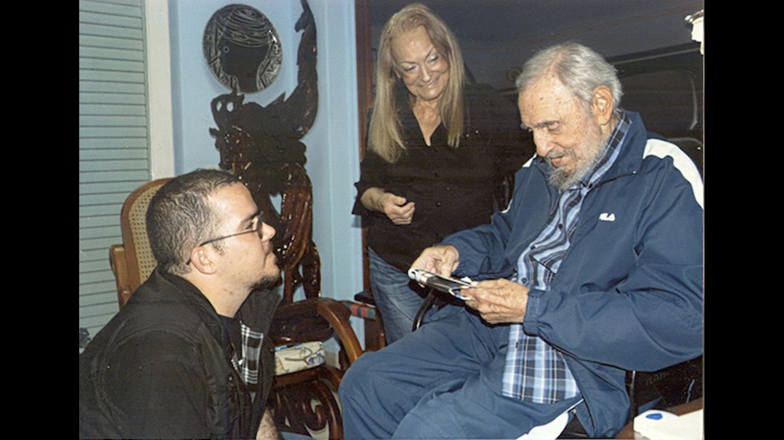 In this picture provided by CubaDebate, Castro talks to Randy Perdomo, president of Cuba's University Students Federation, during a February meeting in Havana.