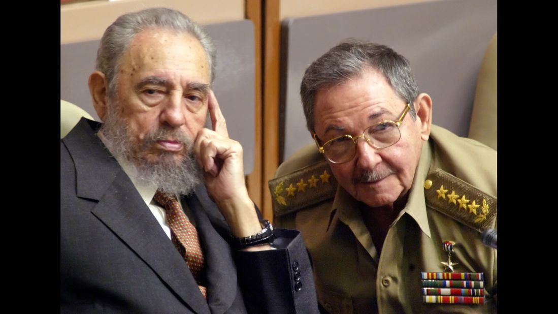 Castro, left, and his brother Raul attend a session of the Cuban parliament in July 2004.