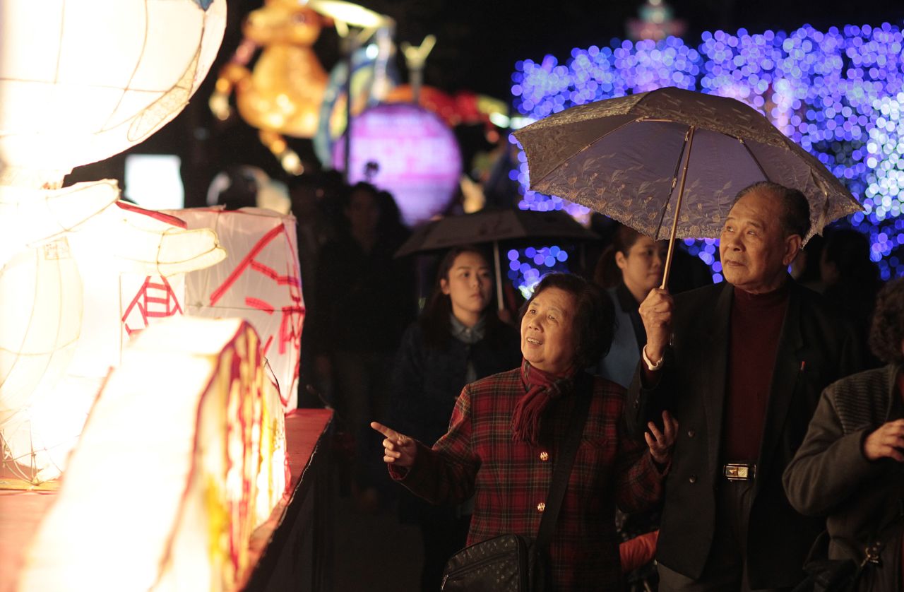 Visitors walk through a display of elaborate lanterns at the start of the Lantern Festival marking the end of Chinese Lunar New Year celebrations in Taipei on March 5.