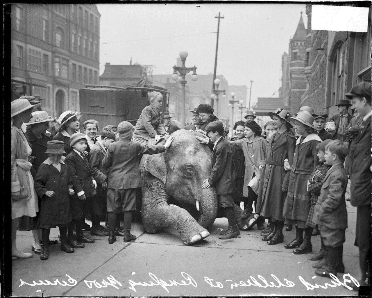 A blind child in Chicago sits on the back of a kneeling elephant from the Ringling Brothers Circus in April 1917. Ringling Bros. will have elephants perform for the final time Sunday, May 1. It had previously said <a href="http://money.cnn.com/2015/03/05/news/ringling-bros-circus-elephants/index.html" target="_blank">that all of its elephants would be retired by 2018, </a>but the retirement came early.